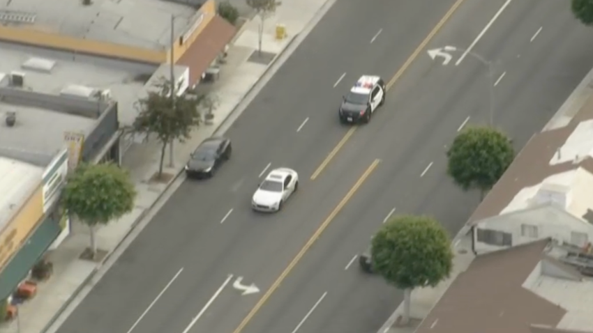 Officers chase a Maserati Tuesday in the Inglewood area.